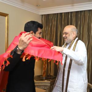 Megastar Chiranjeevi and Ram charan met with Amit Shah