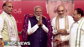 Prime Minister Modi claims victory in close India elect